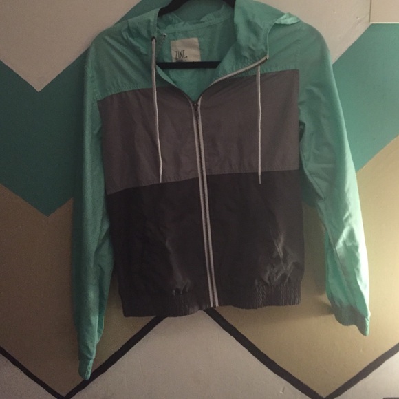 Teal light and dark gray windbreaker