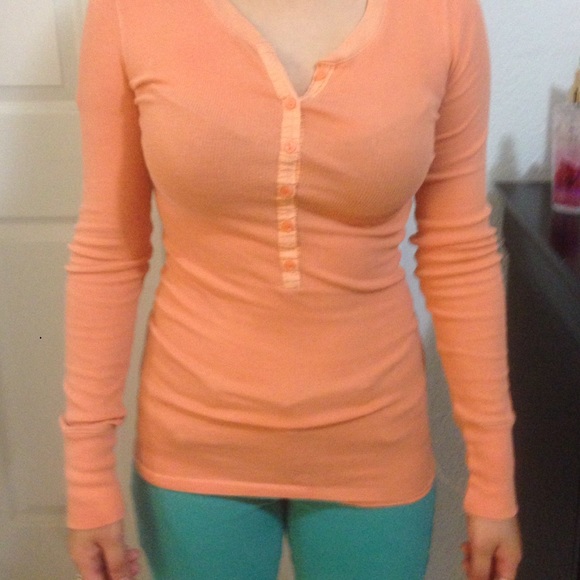Peach long sleeved striped button up long sleeve
