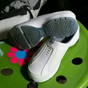 White slip on walking shoes