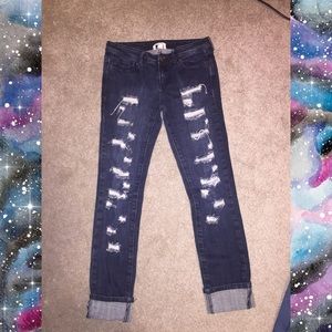 Dark wash distressed skinny jeans