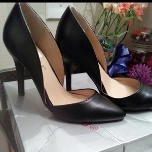 Short classy heels in black  , brand new with box!