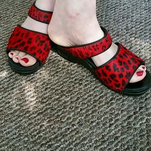 Awesome Dansko clog sandals red leopard