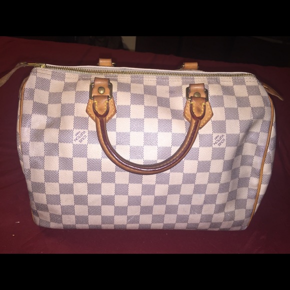 Whit Louis Vuitton speedy bag