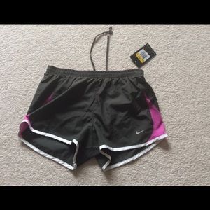 Pink and grey Nike running shorts