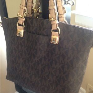 RESERVED!!! Mikael Kors brown signature tote.