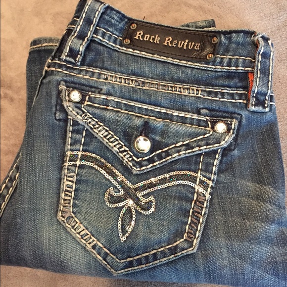 Medium wash Rock Revival jeans.