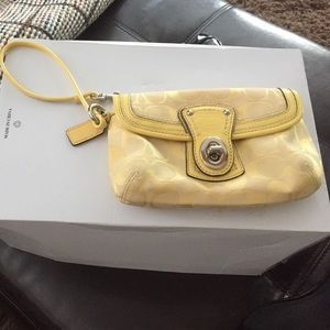 Yellow fabric coach wristlet