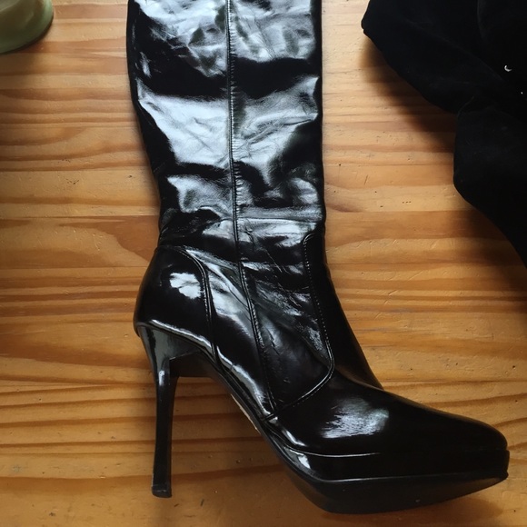 Black patent leather knee high boots
