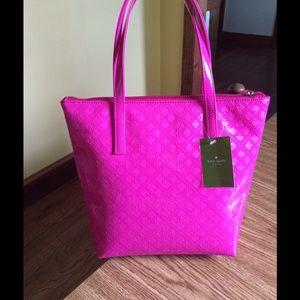 Pink Kate spade handbag and Copper coach purse