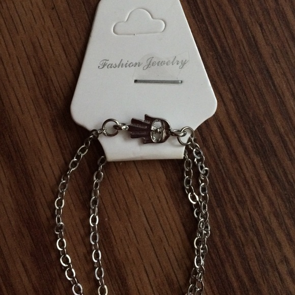 Silver tone hand of Fatima necklace