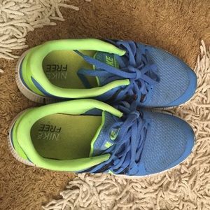 Blue and green Nike free runs 5.0