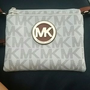Michael Kora shoulder purchase
