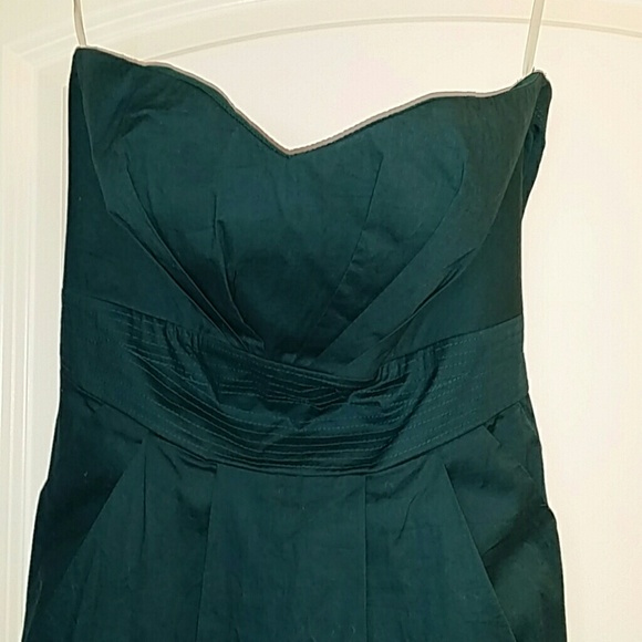 Sweetheart tube top dress cinches at the waist