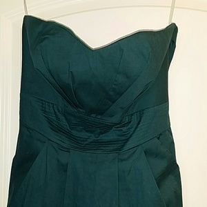 Sweetheart tube top dress cinches at the waist