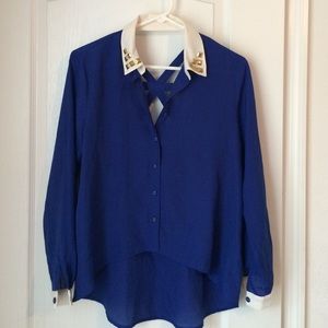 Blue shirt with gold embellishments on collar