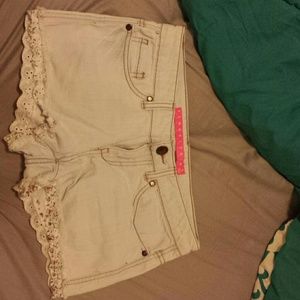 Light blue cut off shorts w/ floral design