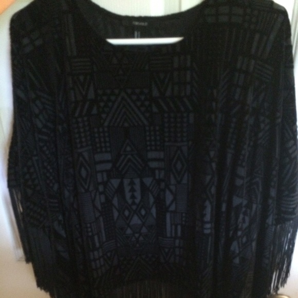 Fringed, velvet blouse with Aztec pattern