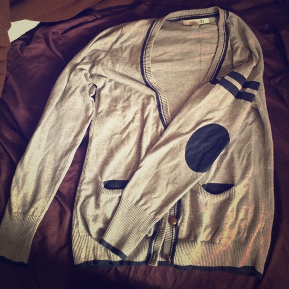 Grey cardigan with navy elbow patches