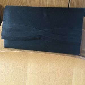 Small black clutch with strap
