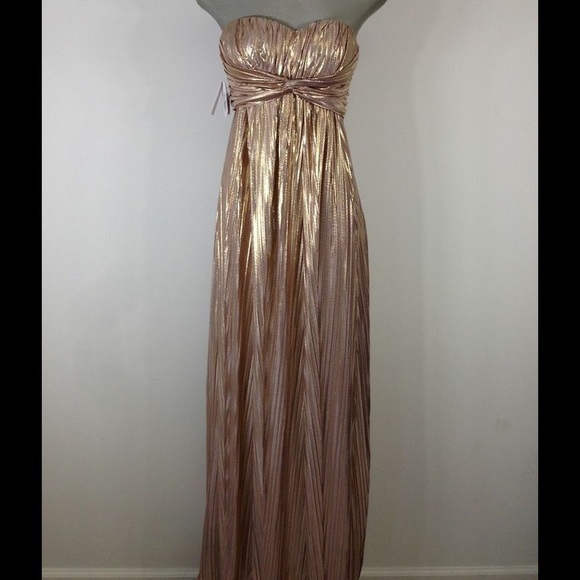 Golden goddess in this long flowing dress