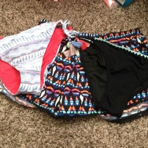 2 bikinis and shorts