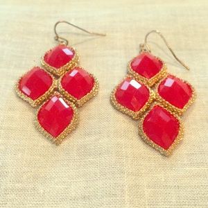 Red statement chandelier earrings