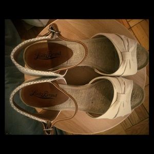 Tan and beige wedges