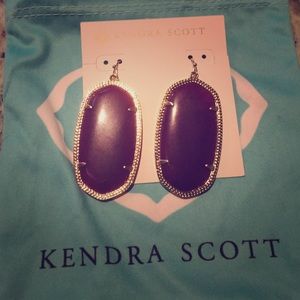 Purple Danielle Kendra Scott earrings.