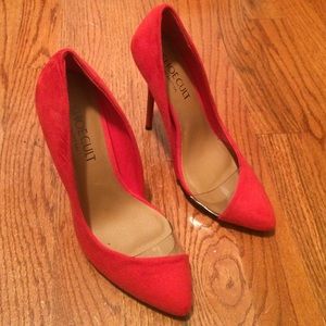 Red stiletto pumps