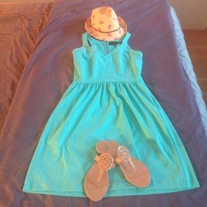 Turquoise dress with pockets