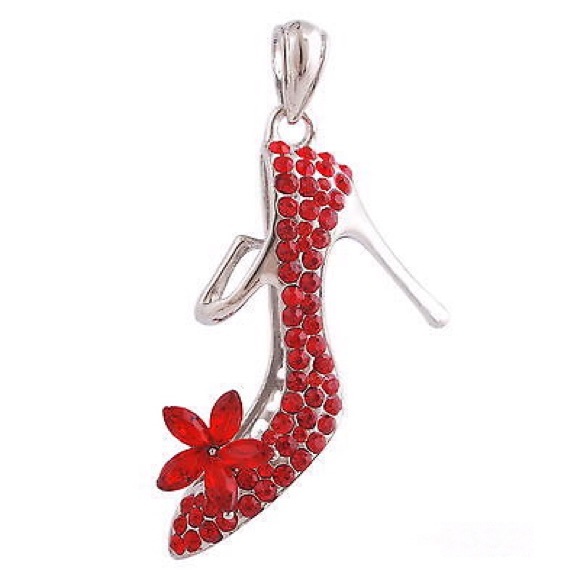Jewelry - Cinderella's ugly sister red encrusted slipper.