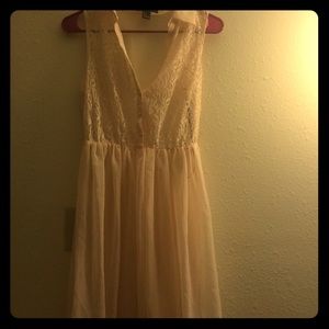 Selling a sun dress pinkish beige