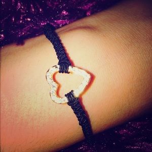 Black bracelet with heart charm