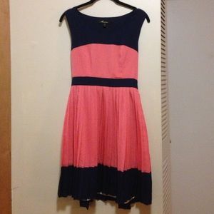 Color blocked dress with pleated skirt