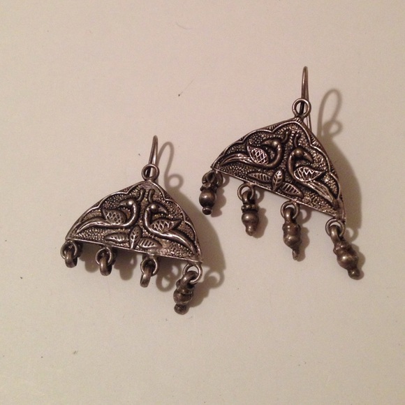 Indian metal earrings with peacock design