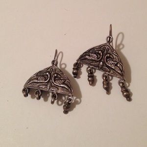 Indian metal earrings with peacock design