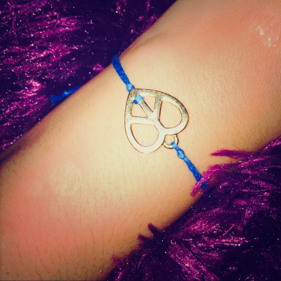 Blue bracelet with peace sign/heart