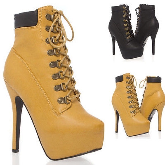 Lace up stiletto heel construction ankle bootie