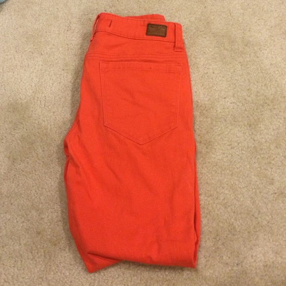 Bright orange skinny jeans