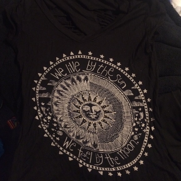 We live by the sun and feel by the moon top
