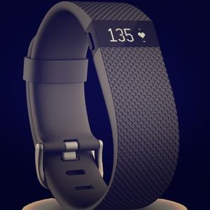 Fitbit Charge. Brand new. Never opened. Large