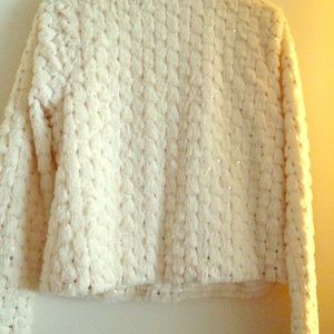 White sequined jacket.