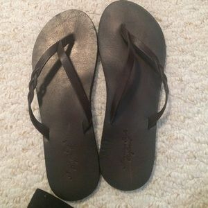 AEO brown braided flip flops.
