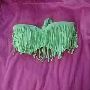 Lime green swimsuit top bought separately.