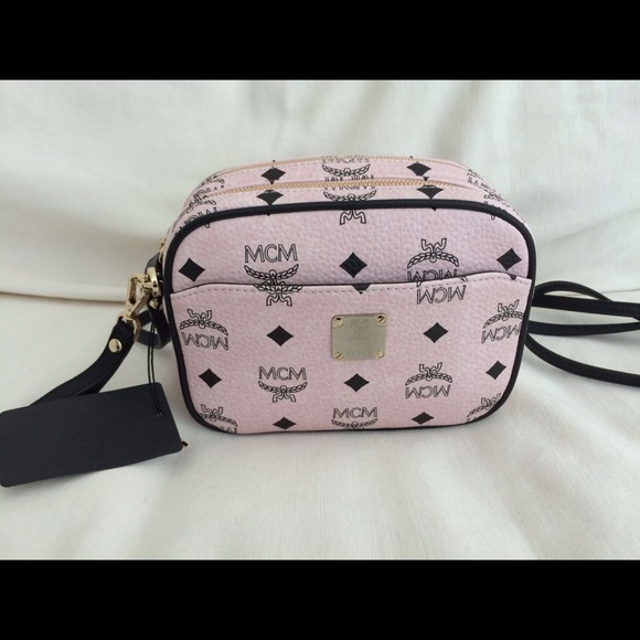 Sold. MCM baby pink cross body bag