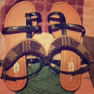 Black and gold sandals