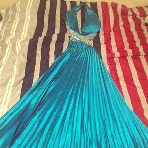 Beautiful turquoise prom dress with open back