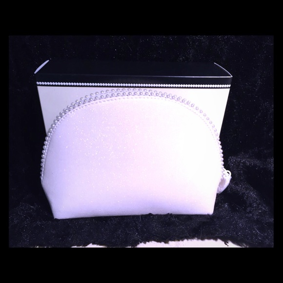 Mac cosmetics while sparkle bag
