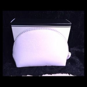 Mac cosmetics while sparkle bag
