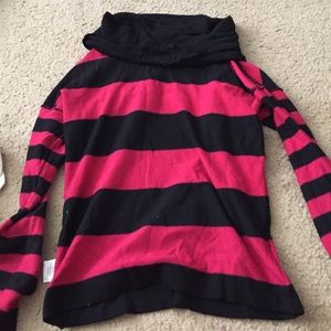 Long sleeve, lay over shoulder neckline.